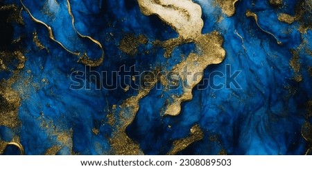Luxury abstract fluid art painting in alcohol ink technique,mixture of deep blue and gold paints. Imitation of marble stone cut, glowing golden veins.Tender and dreamy design.Invitation card design.