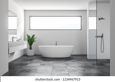 Luxury bathroom interior with white walls, a tiled black floor, a white bathtub, a shower and a double sink. A narrow horizontal window. Scandinavian style. 3d rendering