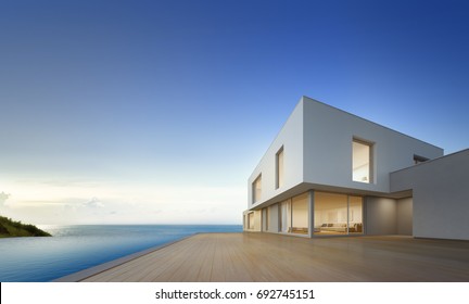 Luxury beach house with sea view swimming pool and empty terrace in modern design, Vacation home for big family on blue sky background - 3d rendering of residential building