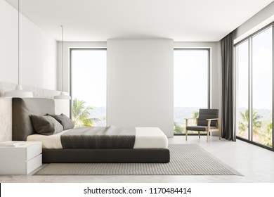 Luxury bedroom interior with white walls, a concrete floor with a carpet, loft windows and a master bed with bedside tables. Side view 3d rendering mock up