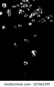 Luxury Diamonds Falling On Black Backgrounds