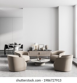 Luxury White Living Room, Hotel Suite, Office Lounge Interior With Four White Armchairs Standing Near A Round Table. Cabinet With Poster And Lamp And Dining Room In The Background. 3d Rendering