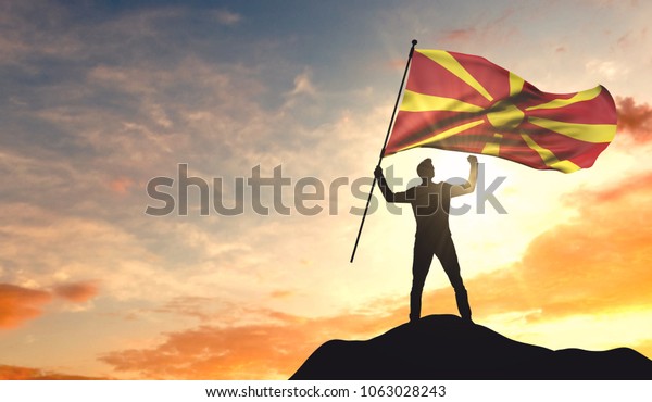 macedonia-flag-being-waved-by-600w-1063028243.jpg