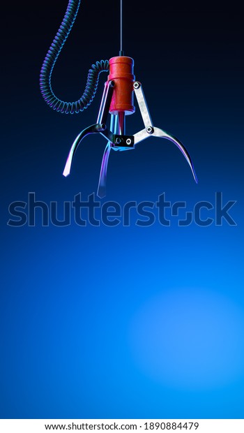 Machine Robotic Claw on Blue\
Gradient Background. Crane Game. Gambling. Happy Chance. 3d\
Rendering