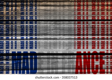 Made in France  in bar code. Lines consist of same words Blueprint backdrop. Image relative to France retail. Wood textured wall