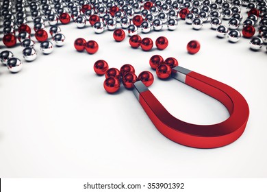 Magnet that attracts only the red balls