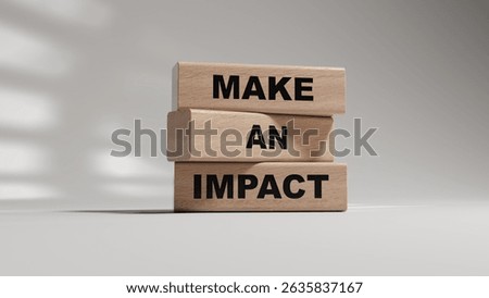 Make an impact symbol. Concept word Make an impact on wooden blocks.Business and Make an impact concept. Copy space.3D rendering on white background.