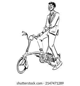 Male Of African Descent Sitting Relaxed On A Folding Bike. The Kind Of Portable Bicycle That You Can Take On A Bus Or Train