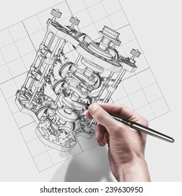 Male Hand With Pen. Engineer Working On Cad Concept V8 Car Engine