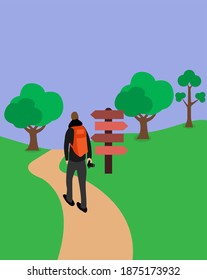 A man with the backpack walking in the forest
