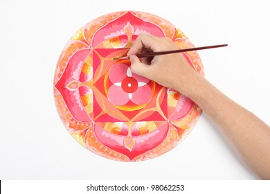 Man Hand Painting Abstract Red Picture With Circle Pattern, Mandala Of Muladhara Chakra