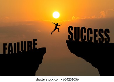 Man jump across text failure to success over cliff on sunset background