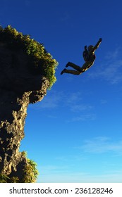 The  man jumps from a cliff.