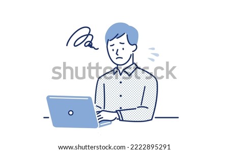 A man looking at a laptop with a dubious expression