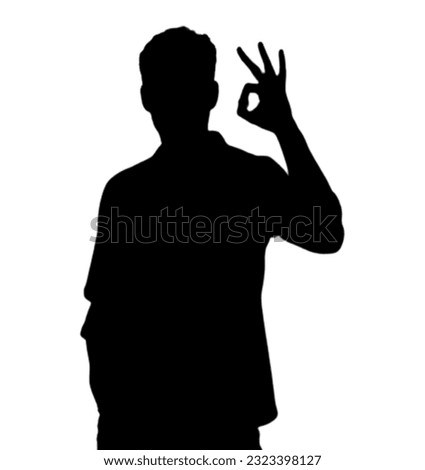 Man making a check mark, giving approval with his fingers, shadow silhouette young man, this business is successful meaning, Black and white shadow affirmation