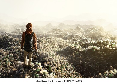 Man Stands On Top Of Plastic Waste Mountains