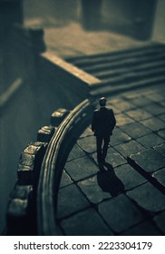 Man In Suit Walks At An Ancient Ruin. High Angle View. 3D Render.