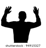 Man surrendering with both hands raised in air