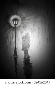 Man Under A Street Lamp With Rain