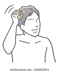 Man Using A Scalp Massage Brush For Scalp Care