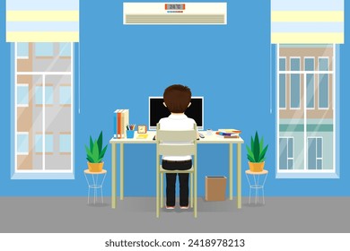 man working at desk with computer
