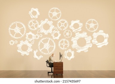 Man works on computer with cogwheels drawn on background . Freelancing and problem solving concept . This is a 3d render illustration .
