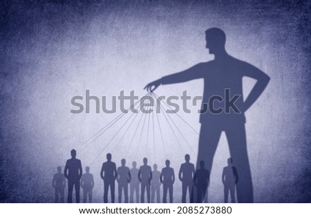 Manipulation Concept - Manipulative Person - Psychological Manipulation - Conceptual Illustration with Shadowy Figure Manipulating People as Puppets [[stock_photo]] © 