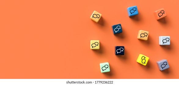 many cubes with speech bubble icons on orange background - 3D rendered illustration - Shutterstock ID 1779236222