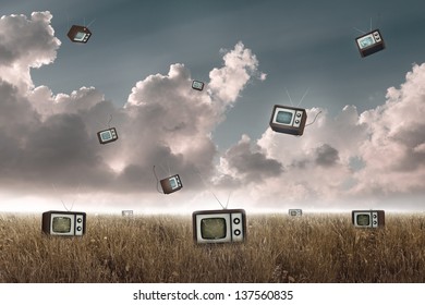 Many Television Falling To The Sky In A Meadow