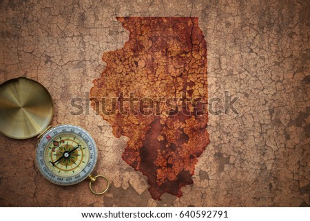 map of illinois state on a old vintage crack paper background with compass