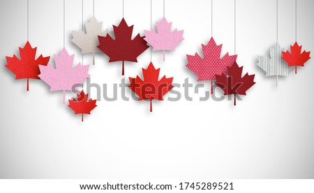 Maple leaves with paper texture effect. Canada Day holiday concept.