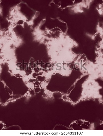 A maroon and white tiedye pattern creates an abstract and textured background