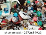 A massive landfill filled with a diverse range of waste, symbolizing the environmental crisis caused by excessive garbage accumulation. Industrial and electronic waste. Rubbish dump. Garbage
