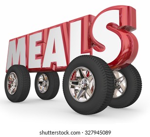 Meals Word In Red 3d Letters On Wheels Or Tires To Illustrate Volunteers Delivering Food To Elderly Or Needy As Charity Service