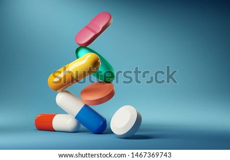 Medical balancing act. A group of medicine pills and antibiotics balacning on top of each other. 3D render illustration. Stock fotó © 