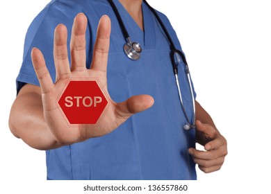 Medical Doctor Hand Surgeon Shows Stop Sign With His Hand As Concept