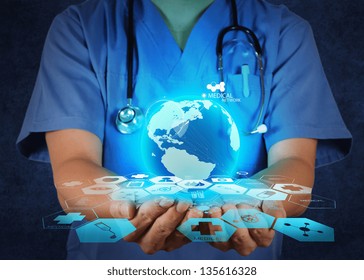 Medical Doctor Holding A World Globe In Her Hands As Medical Network Concept