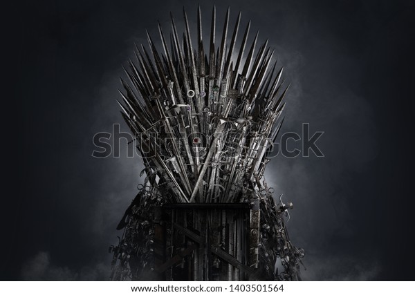 Medieval iron throne of kings made of weapons: swords,
daggers, spears, knives blades. Misterious low key middle ages
fantasy background design element.  Dark knights game concept.
Clipping path.
3D