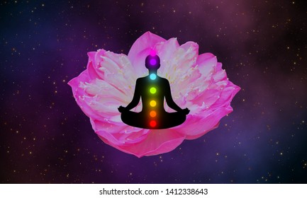 Meditation man with seven chakras and pink lotus on the galaxy design background.