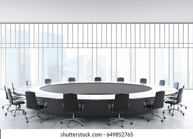 Meeting Room Interior With A Large Black Round Table, Office Chairs Standing Around It And A Window With A Magnificent View. 3d Rendering Mock Up