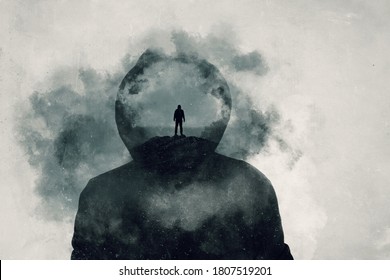 A mental health concept. A mans head covered in clouds. With a double exposure of a mans silhouette over layered on top.