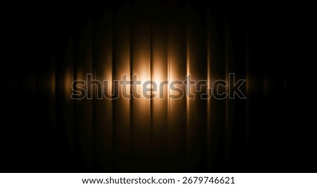 A mesmerizing abstract background featuring golden light streaks, perfect for graphic and web design. Its dark backdrop enhances the radiant, shiny effect.