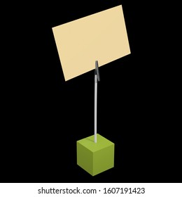 Message holder. Card holder with clip and note on cube base. 3d renderon black background.