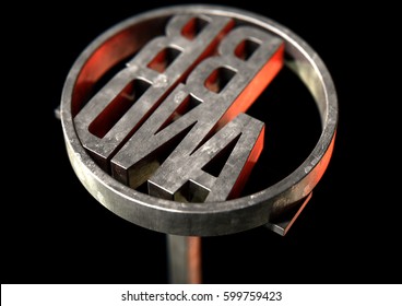 A Metal Cattle Branding Iron With The Word Brand As The Marking Area On An Isolated Dark Surface - 3D Render