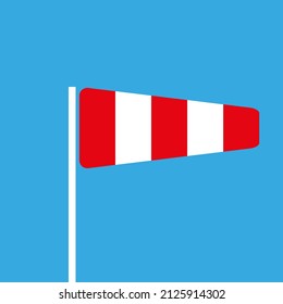 Meteorology wind cone icon. Red and white striped windsock on blue background