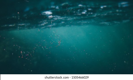 Microplastics Floating In Ocean Water, Micro Plastic Pollution (3d Render)