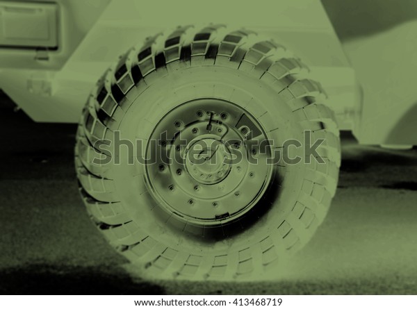 Military\
armored car wheel illustration close up\
view