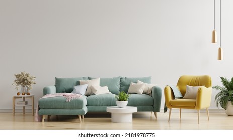 Minimal interior living room has a green sofa and yellow armchair on empty white color wall background.3D rendering