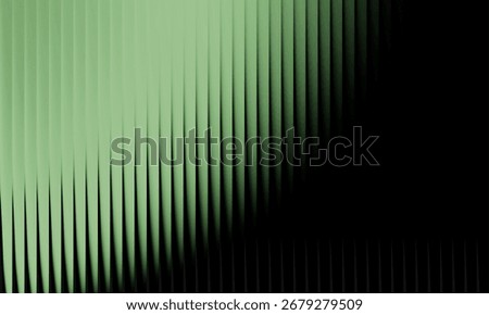 A minimalist abstract design composed of sharp, vertical green lines that transition from a bright, illuminated state to deep shadow against a stark black background, emphasizing form and contrast.