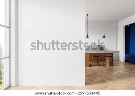 Minimalist interior featuring an empty white wall for design mockup, next to a stylish kitchen with wood and stone elements, illuminated by natural light. 3D Rendering.